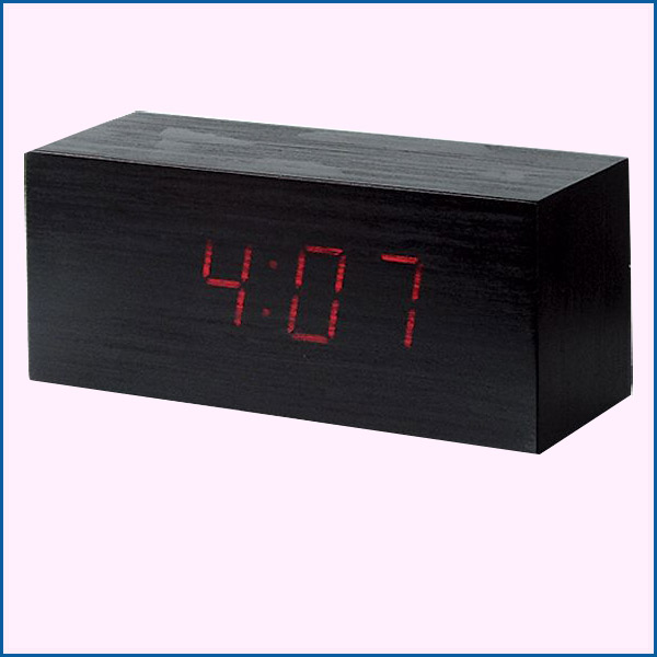 Clock with alarm block of wood